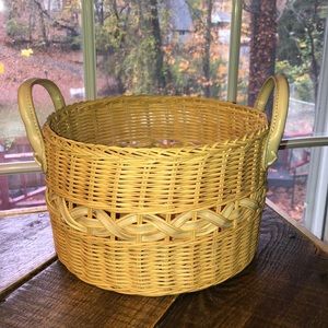 Woven wicker and leather basket